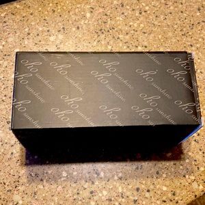 Bluetooth audio waterproof sunglasses. New in box, never used. Oho sunshine.